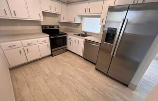 Great unit with pool view, pretty tile flooring.