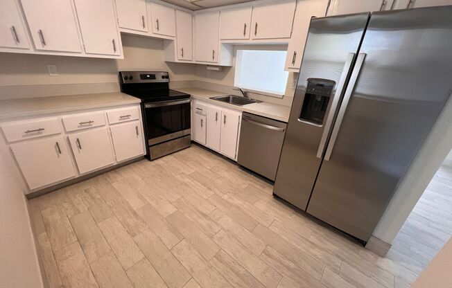 Great unit with pool view, pretty tile flooring.