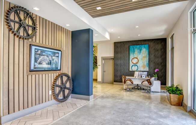 a room with a table and a wheel on the side of it