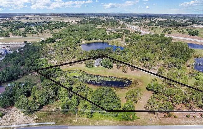 STUNNER! Five Acre Property in Winter Garden with scenic views! Available now!