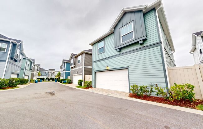 Extraordinary single-family Courtyard Home nestled within David Weekley's exclusive enclave of Tidal Pointe!