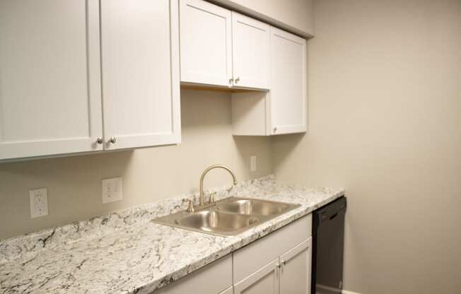 Kitchen view with built in shelving