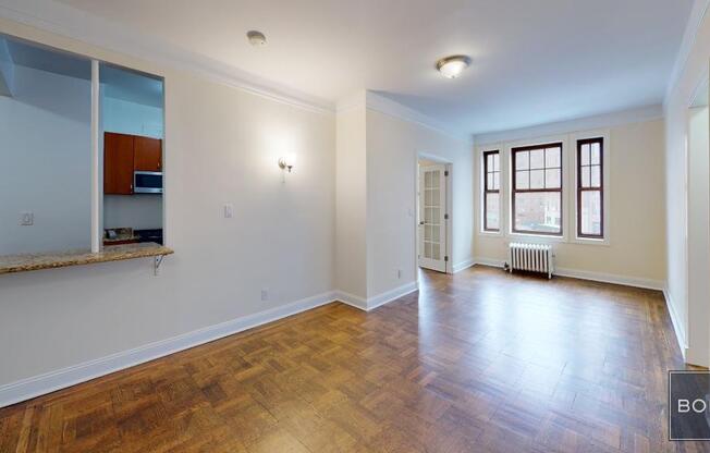 201 205 W 11 ST