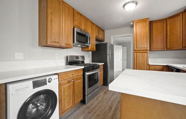 Upgraded Kitchen Appliances, Cabinets, and Countertops