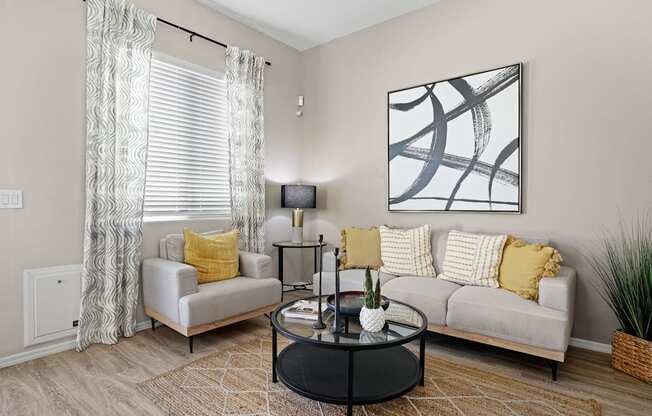 a living room with a couch and a coffee table