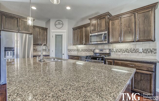 Large 4 Bed 2.5 Bath with its own Putting Green in Ridgefield!