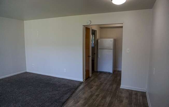Living room and kitchen at Silverstone Apartments in Warren, Michigan