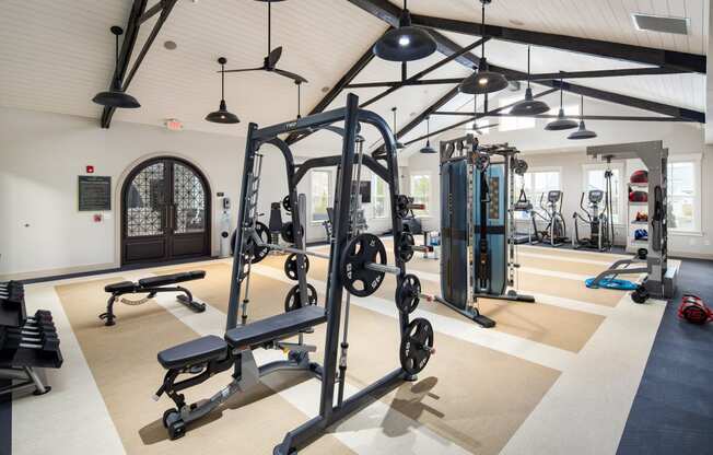 Premium fitness center with free weights and strength machines at The Highland in Augusta, GA
