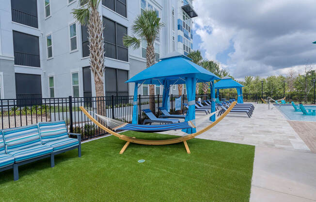 Ciel Luxury Apartments | Jacksonville, FL | Poolside Hammocks and Cabanas