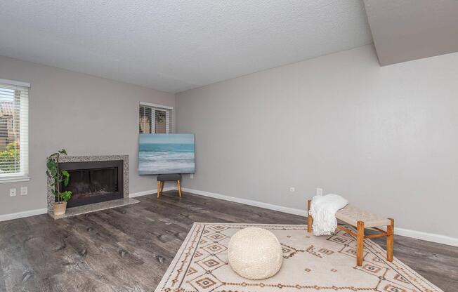 a room filled with furniture and a fireplace