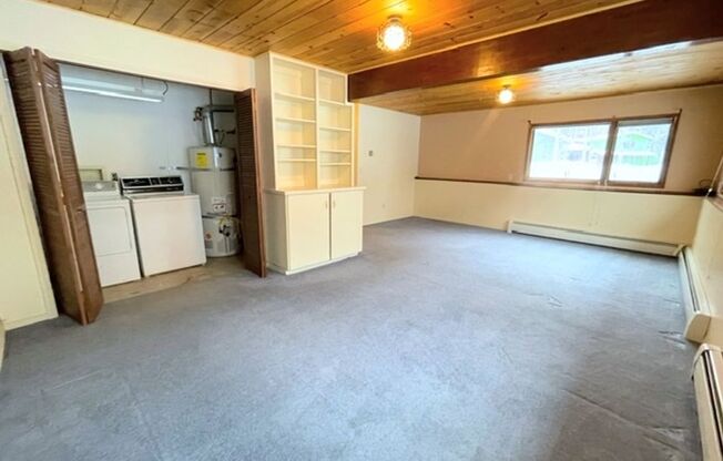 East Anchorage Four Bedroom Home with Bonus/Family Room, Fireplace, and Attached Garage
