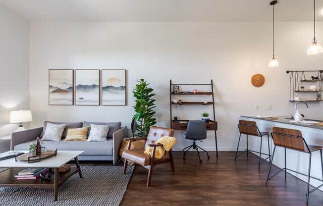 a living room with a couch and a table