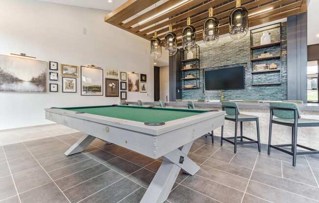 play a game of pool on our billiards table in our game room  at Plat 4 at Research Triangle, North Carolina