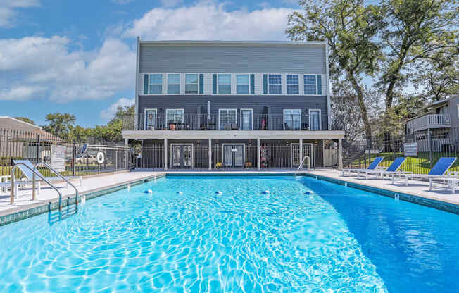 Large swimming pool behind the leasing office building at Maplewood apartments in Shreveport, LA.