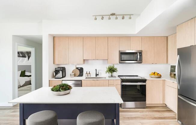 Contemporary kitchens at Modera Aventura showcase clean lines, warm finishes, and thoughtful design.