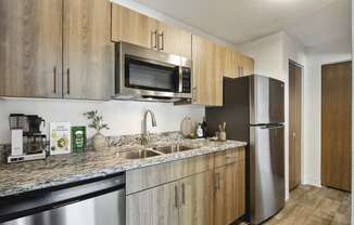 Eden Commons Apartments in Eden Prairie, MN Kitchen and Dishwasher with Updated Appliances