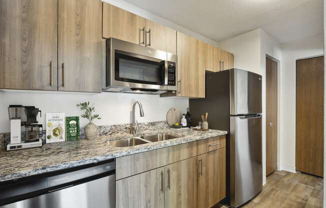 Eden Commons Apartments in Eden Prairie, MN Kitchen and Dishwasher with Updated Appliances