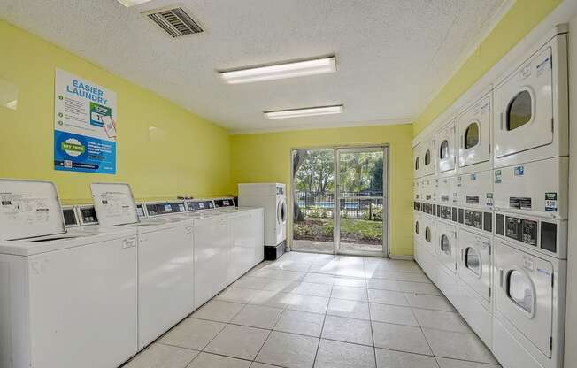 Clothing Care and Laundry Center at Fernwood Grove Apartments at 4900 MacDill Ave in Tampa, Florida