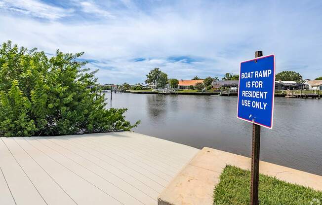 A sign on a boat ramp states that it is for resident use only.