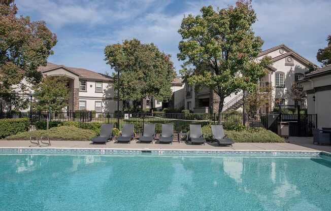 Stoneridge apartments, Roseville, CA, pool and lounge chairs