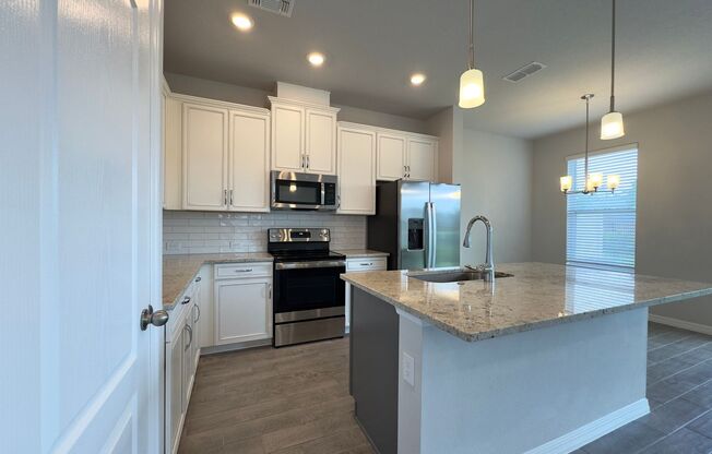 4 Bedroom, 3 Bath Corner Unit Town Home in Lake Meadow Landing!