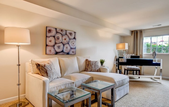 carpeted living room in apartment at the villages at general grant