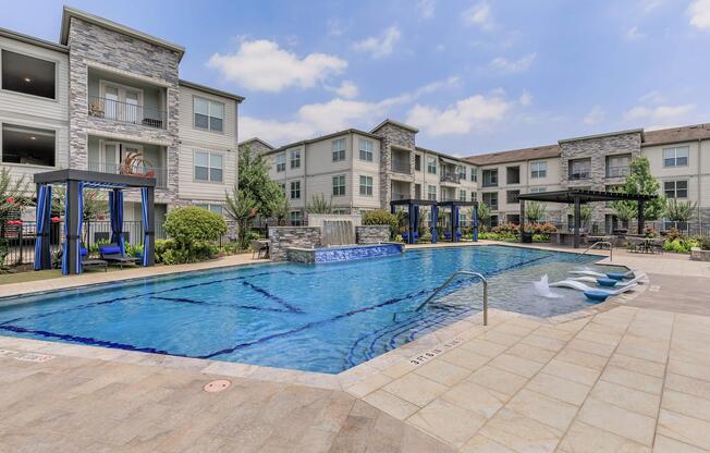 a pool next to a building