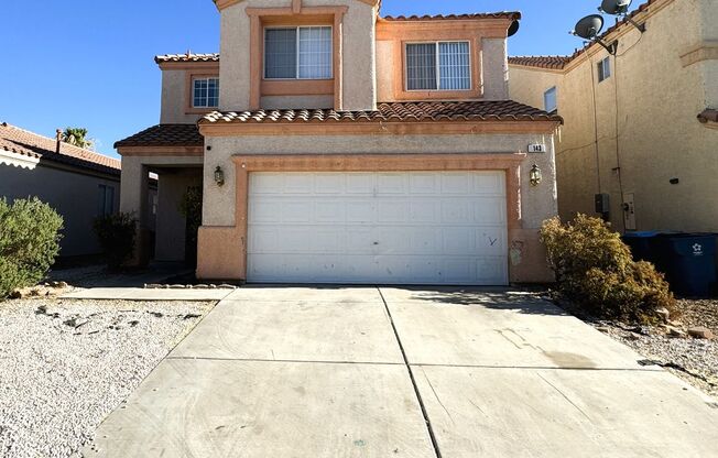 Spacious family home near Silverado Ranch park with 5 bedrooms and one bed & bath downstairs!