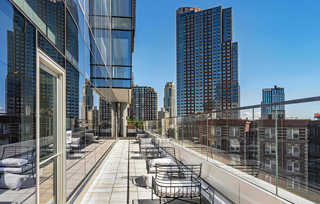 3thirty3 new rochelle ny apartment high rise photo of outdoor seating area overlooking skyline views