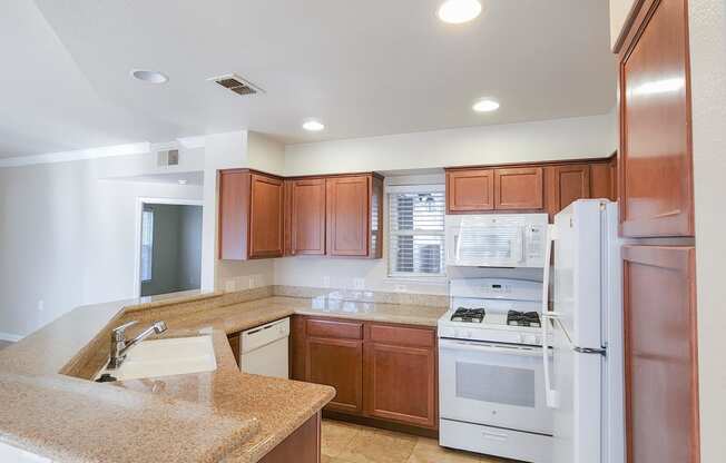 kitchen with travertine  in Elmwood Floor plan