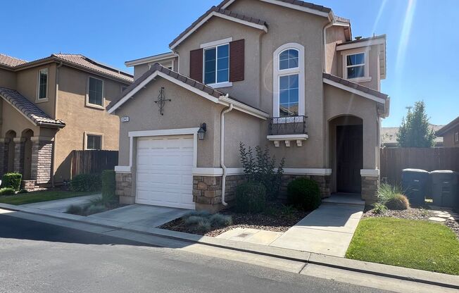3 bedroom, 2 1/2 bathroom home located in Clovis
