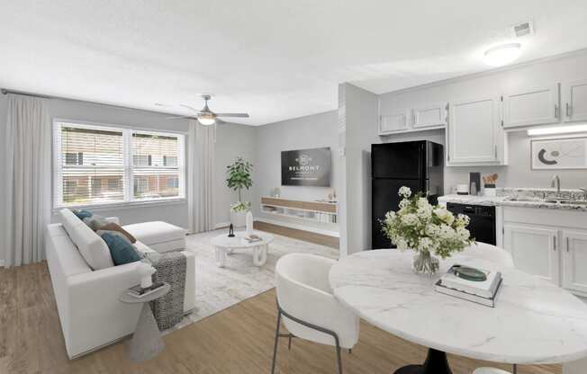 a living room and kitchen with white furniture and a white marble table