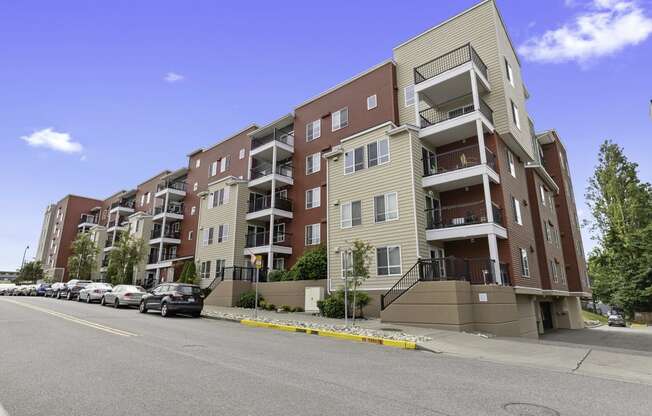 a large view of the property building with balconies at Arabella Apartment Homes, Washington, 98155