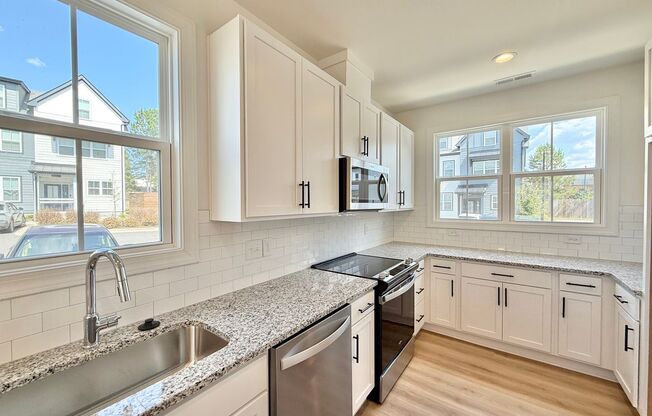 **OFFERING RENT PROMOTION FOR FIRST 6 MONTHS** Newly Built 4BD, 3.5BA End-Unit Raleigh Townhome in a Great Location