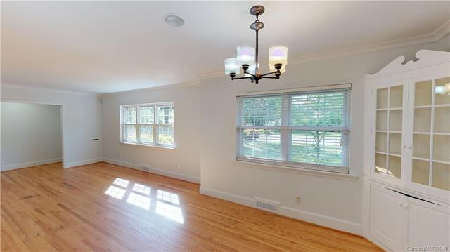 Amazing Ashbrook home that feels so private but is almost across the street from Park Road Shopping Center.