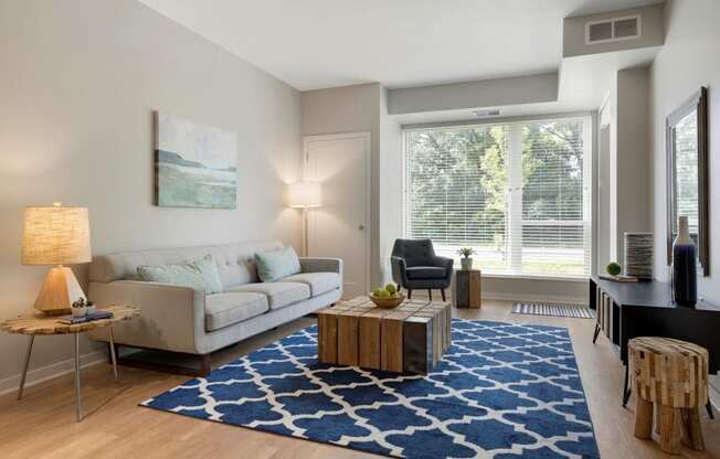 Living Room With Large Windows at The McMillan Apartments in Shoreview, MN 55126