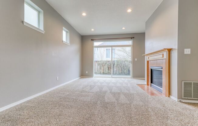 Beautiful 3 Bedroom Home in Beaverton with Fenced Patio, Attached Garage & Fireplace!