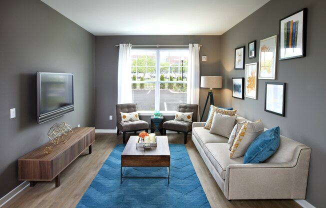 Nice Living Room with TV at The Waverly at Neptune