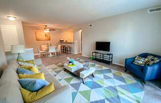 Spacious living room open to the dining room at Camelot East Apartments, Fairfield, 45014