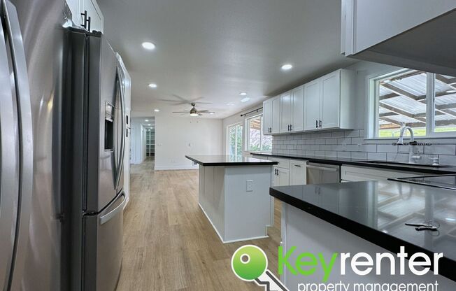 Completely Remodeled 5 Bed 3 Bath Home