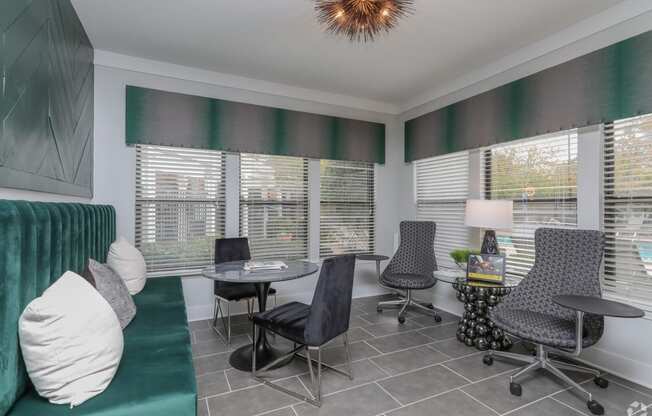 Community business center with lounge area at The Columns at Lake Ridge, Dunwoody 30338
