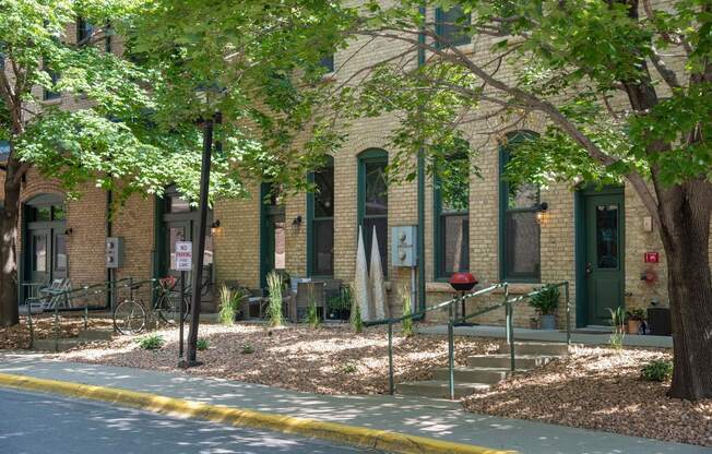 Exterior of FreightYard Townhomes and Flats featuring private walk up entrances.