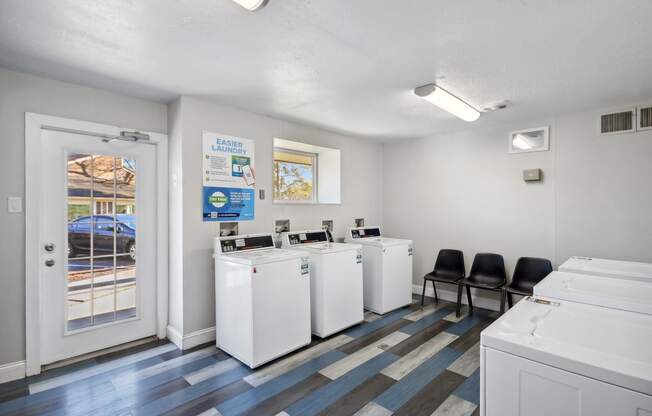 a laundry room at Johnston Creek Crossing in Charlotte, NC