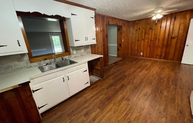 3 bedroom 1.5 bath house available!   Large yard!