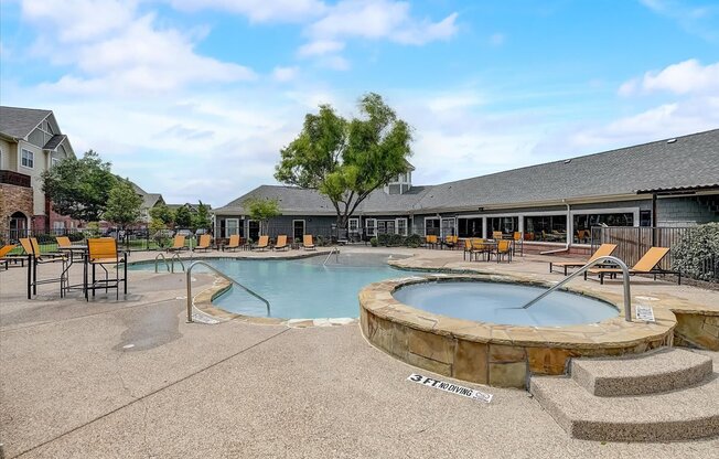 our apartments showcase an outdoor pool and hot tub