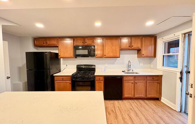 Spacious Townhome with Updated Kitchen & Private Backyard in Edmondson Heights