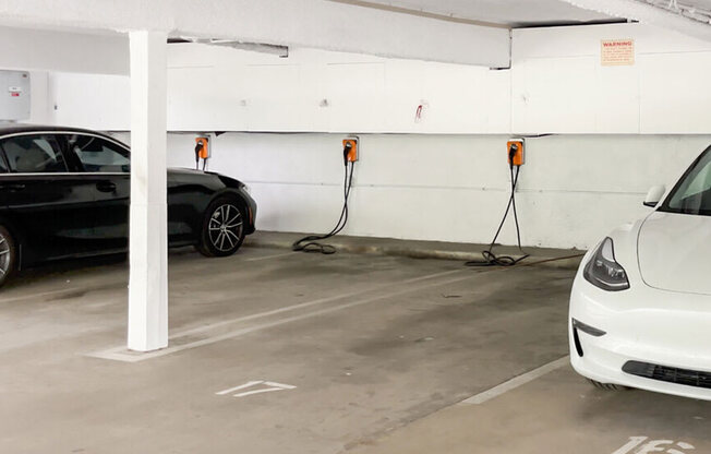 Large covered parking lot with EV Chargers.