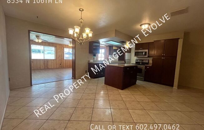 8534 N 106 LN