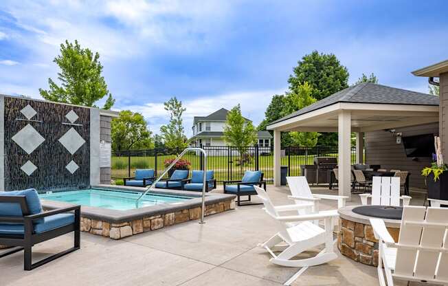 Pool and hot tub at Quarry Apartments and Townhomes in DeWitt Michigan