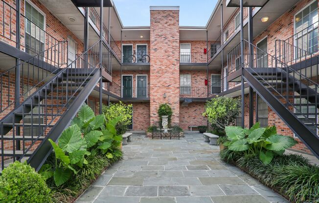 Gated Condo steps from Maple Street & St Charles!